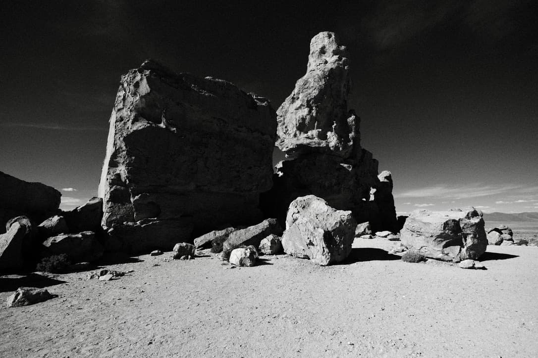 large rock blocks in the desert, in black and white
